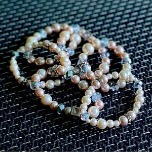 Set of 6 pink pearl and crystal bracelets. Excellent condition.